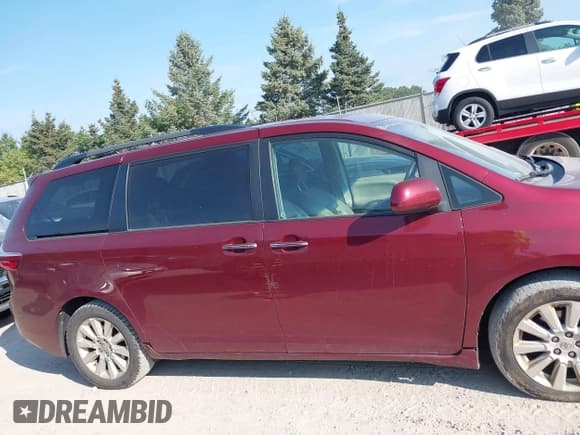 ✅ 2015 Toyota Sienna Limited • VIN: 5TDDK3DC9FS101903 • Lot: 43180590. Listed on IAAI with 151,869 mi. Free auction sales archive from the USA and detailed vehicle history report at DreamBid. Image 13.