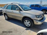 ✅ 1999 Lexus RX 300 • VIN: JT6HF10U4X0051562 • Lot: 69866285. Listed on Copart with 216,792 mi. Free auction sales archive from the USA and detailed vehicle history report at DreamBid. Image 4.