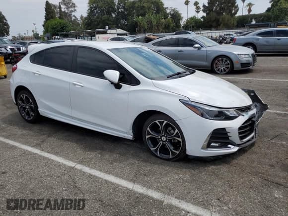 ✅ 2019 Chevrolet Cruze LT • VIN: 3G1BE6SM1KS539227 • Lot: 63531273. Listed on Copart with 82,320 mi. Free auction sales archive from the USA and detailed vehicle history report at DreamBid. Image 4.