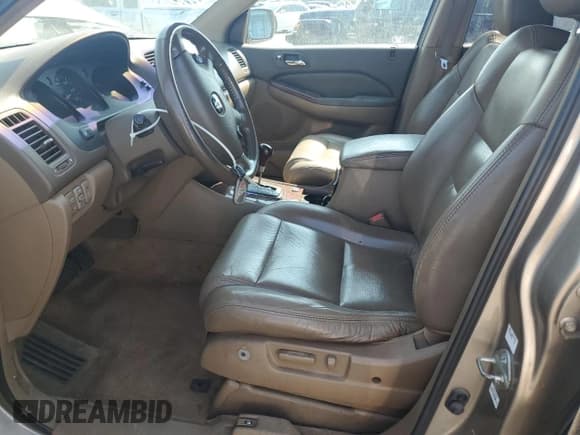 ✅ 2003 Acura MDX Touring • VIN: 2HNYD18673H548738 • Lot: 66915735. Wystawiony na Copart z przebiegiem 262 963 mil. Bezpłatny archiwum sprzedaży aukcyjnych z USA i szczegółowy raport historii pojazdu na DreamBid. Zdjęcie 7.