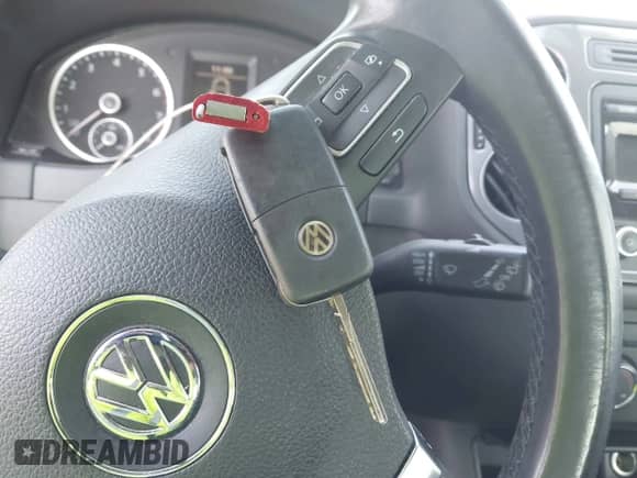 2013 Volkswagen Tiguan SE z VIN WVGAV7AX9DW542089, wystawiony jako IAAI lot #42212502 z przebiegiem 173 804 mil mil oraz . Historia ofert i sprzedaży dostępna na DreamBid. Obrazek 11.