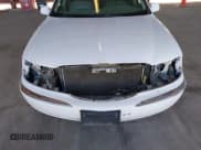 ✅ 2000 Lincoln Continental • VIN: 1LNHM97V9YY821894 • Lot: 41657199. Wystawiony na IAAI z przebiegiem 218 330 mil. Bezpłatny archiwum sprzedaży aukcyjnych z USA i szczegółowy raport historii pojazdu na DreamBid. Zdjęcie 6.