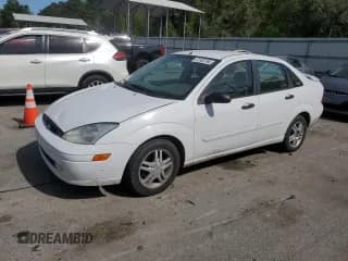✅ 2001 Ford Focus SE • VIN: 1FAFP34301W371756 • Lot: 51803765. Listed on Copart with 157,927 mi. Free auction sales archive from the USA and detailed vehicle history report at DreamBid. Image 1.