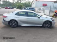 ✅ 2018 Toyota Camry LE • VIN: JTNB11HK9J3028988 • Lot: 42408240. Listed on IAAI with 123,593 mi. Free auction sales archive from the USA and detailed vehicle history report at DreamBid. Image 14.