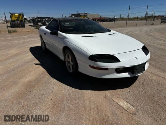 1997 Chevrolet Camaro z VIN 2G1FP22KXV2124842, wystawiony jako Copart lot #54201565 z przebiegiem 63 763 mil mil oraz Czysty tytuł • Clean title. Historia ofert i sprzedaży dostępna na DreamBid. Obrazek 1.
