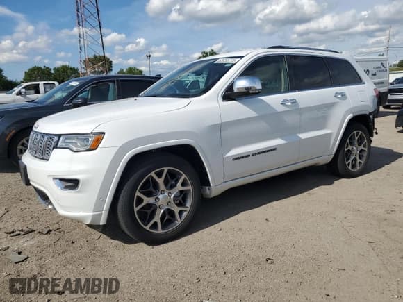 ✅ 2019 Jeep Grand Cherokee Overland • VIN: 1C4RJFCG5KC590780 • Lot: 64016825. Listed on Copart with 26,694 mi. Free auction sales archive from the USA and detailed vehicle history report at DreamBid. Image 1.