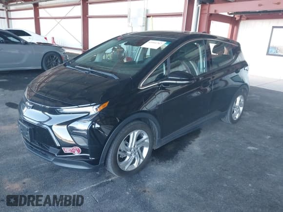 ✅ 2023 Chevrolet Bolt EV 1LT • VIN: 1G1FW6S04P4132926 • Lot: 43551767. Listed on IAAI with 25,996 mi. Free auction sales archive from the USA and detailed vehicle history report at DreamBid. Image 2.