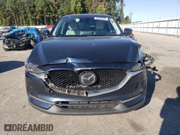 ✅ 2021 Mazda CX-5 Touring • VIN: JM3KFACM5M1354857 • Lot: 89668295. Wystawiony na Copart z przebiegiem 55 797 mil. Bezpłatny archiwum sprzedaży aukcyjnych z USA i szczegółowy raport historii pojazdu na DreamBid. Zdjęcie 5.
