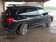 ✅ 2023 Honda Passport EX-L • VIN: 5FNYF8H52PB033173 • Lot: 42376245. Listed on IAAI with 24,134 mi. Free auction sales archive from the USA and detailed vehicle history report at DreamBid. Image 4.