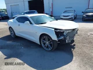✅ 2019 Chevrolet Camaro 1LT • VIN: 1G1FB1RX3K0156846 • Lot: 42890582. Listed on IAAI with 70,676 mi. Free auction sales archive from the USA and detailed vehicle history report at DreamBid. Image 1.