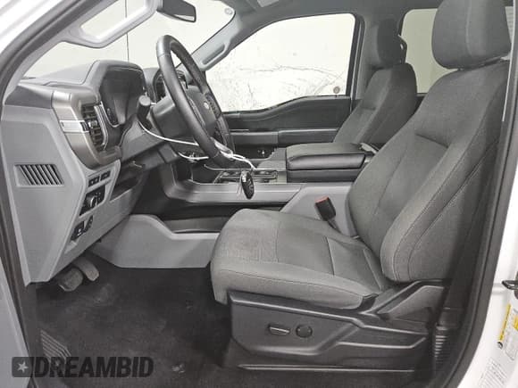 ✅ 2024 Ford F-150 Lightning XLT • VIN: 1FTVW3LKXRWG06404 • Lot: 84980215. Listed on Copart with 14,760 mi. Free auction sales archive from the USA and detailed vehicle history report at DreamBid. Image 7.