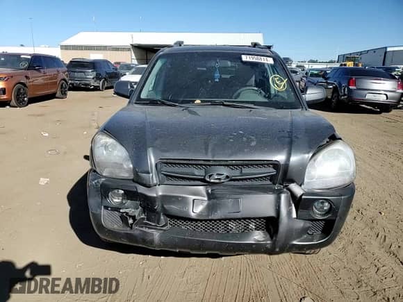 2007 Hyundai Tucson SE with VIN KM8JN72D57U518473, listed as a Copart auction lot 71998814 with 106,340 mi miles and Salvage title. Bid and sale history available at DreamBid. Image 12.