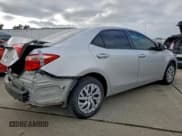 ✅ 2019 Toyota Corolla LE • VIN: 5YFBURHE1KP898277 • Лот: 93642235. Опубликован ранее на Copart с пробегом 66 894 миль. Бесплатный доступ к архиву аукционных продаж из США и подробный отчёт об истории автомобиля на DreamBid. Изображение 3.