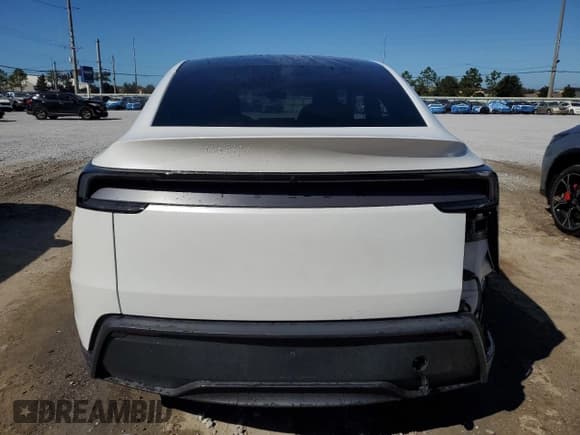 ✅ 2026 Tesla Model Y Long Range • VIN: 7SAYGDED4TA449835 • Lot: 87257505. Listed on Copart with 2,469 mi. Free auction sales archive from the USA and detailed vehicle history report at DreamBid. Image 6.