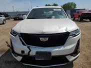 ✅ 2021 Cadillac XT6 Sport • VIN: 1GYKPGRS7MZ134193 • Lot: 61092855. Wystawiony na Copart z przebiegiem 54 101 mil. Bezpłatny archiwum sprzedaży aukcyjnych z USA i szczegółowy raport historii pojazdu na DreamBid. Zdjęcie 5.
