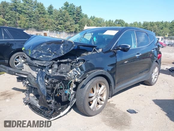 ✅ 2013 Hyundai Santa Fe Sport • VIN: 5XYZWDLA8DG064918 • Лот: 43188919. Опубликован ранее на IAAI с пробегом 97 899 миль. Бесплатный доступ к архиву аукционных продаж из США и подробный отчёт об истории автомобиля на DreamBid. Изображение 2.