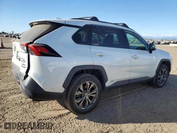 ✅ 2022 Toyota RAV4 Hybrid XLE Premium • VIN: JTMB6RFV1NJ018393 • Lot: 82608345. Listed on Copart with 103,169 mi. Free auction sales archive from the USA and detailed vehicle history report at DreamBid. Image 3.