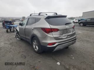 ✅ 2018 Hyundai Santa Fe 2.4L • VIN: 5XYZUDLB7JG570721 • Лот: 67084972. Опубликован ранее на Copart с пробегом 51 327 миль. Бесплатный доступ к архиву аукционных продаж из США и подробный отчёт об истории автомобиля на DreamBid. Изображение 2.
