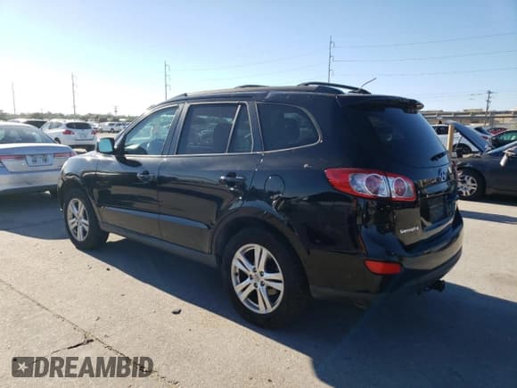 ✅ 2012 Hyundai Santa Fe SE • VIN: 5XYZH4AG5CG122256 • Lot: 80942864. Listed on Copart with 191,971 mi. Free auction sales archive from the USA and detailed vehicle history report at DreamBid. Image 2.