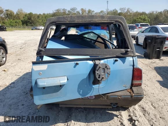 ✅ 1995 Geo Tracker • VIN: 2CNBE18UXS6930601 • Lot: 76079094. Wystawiony na Copart z przebiegiem 276 136 mil. Bezpłatny archiwum sprzedaży aukcyjnych z USA i szczegółowy raport historii pojazdu na DreamBid. Zdjęcie 6.