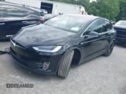 ✅ 2018 Tesla Model X 75D • VIN: 5YJXCBE25JF100156 • Лот: 42370888. Опубликован ранее на IAAI с пробегом 96 129 миль. Бесплатный доступ к архиву аукционных продаж из США и подробный отчёт об истории автомобиля на DreamBid. Изображение 2.