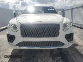 ✅ 2021 Bentley Bentayga V8 • VIN: SJAAM2ZV3MC032885 • Лот: 68701305. Опубликован ранее на Copart с пробегом 32 929 миль. Бесплатный доступ к архиву аукционных продаж из США и подробный отчёт об истории автомобиля на DreamBid. Изображение 5.