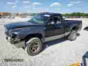 2000 Dodge Dakota Sport z VIN 1B7GG26N7YS667611, wystawiony jako Copart lot #71181355 z przebiegiem 218 471 mil mil oraz Szkoda całkowita • Salvage title. Historia ofert i sprzedaży dostępna na DreamBid. Obrazek 1.