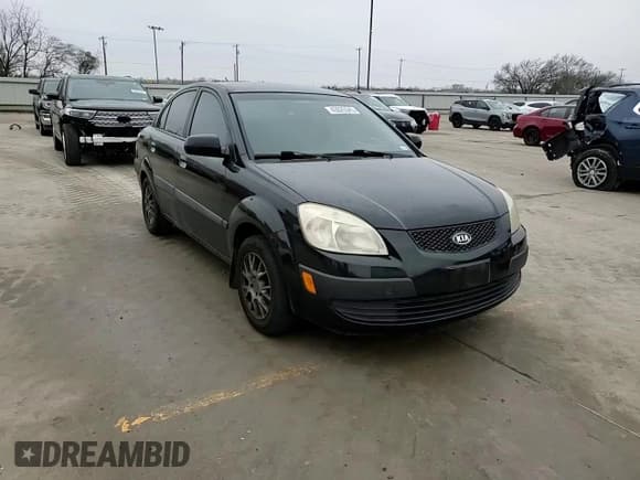 ✅ 2007 Kia Rio LX • VIN: KNADE123876240451 • Lot: 57044685. Wystawiony na Copart z przebiegiem Nie podano. Bezpłatny archiwum sprzedaży aukcyjnych z USA i szczegółowy raport historii pojazdu na DreamBid. Zdjęcie 10.