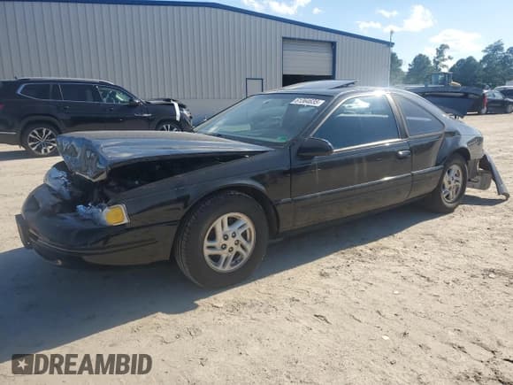 ✅ 1997 Ford Thunderbird LX • VIN: 1FALP62W2VH115047 • Lot: 61364635. Listed on Copart with 57,909 mi. Free auction sales archive from the USA and detailed vehicle history report at DreamBid. Image 1.