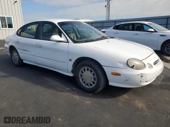 ✅ 1998 Ford Taurus SE Comfort • VIN: 1FAFP53S3WA246260 • Лот: 91224205. Опубликован ранее на Copart с пробегом 167 263 миль. Бесплатный доступ к архиву аукционных продаж из США и подробный отчёт об истории автомобиля на DreamBid. Изображение 4.