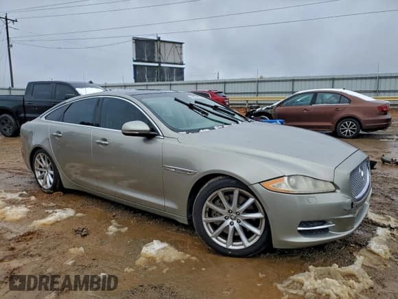 ✅ 2011 Jaguar XJ • VIN: SAJWA1CB4BLV12079 • Lot: 95626675. Listed on Copart with 180,988 mi. Free auction sales archive from the USA and detailed vehicle history report at DreamBid. Image 4.