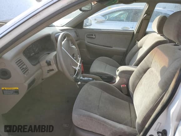 ✅ 2003 Kia Optima LX • VIN: KNAGD126835207539 • Лот: 78136494. Опубликован ранее на Copart с пробегом 96 767 миль. Бесплатный доступ к архиву аукционных продаж из США и подробный отчёт об истории автомобиля на DreamBid. Изображение 7.