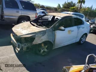 ✅ 2014 Chevrolet Sonic LTZ • VIN: 1G1JE5SG6E4122755 • Lot: 90527845. Listed on Copart with Not provided. Free auction sales archive from the USA and detailed vehicle history report at DreamBid. Image 1.