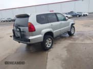 ✅ 2003 Lexus GX 470 • VIN: JTJBT20XX30011789 • Lot: 40788965. Wystawiony na IAAI z przebiegiem 257 955 mil. Bezpłatny archiwum sprzedaży aukcyjnych z USA i szczegółowy raport historii pojazdu na DreamBid. Zdjęcie 4.