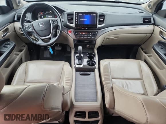 ✅ 2018 Honda Pilot EX-L • VIN: 5FNYF5H56JB009335 • Lot: 87239425. Listed on Copart with 188,498 mi. Free auction sales archive from the USA and detailed vehicle history report at DreamBid. Image 8.