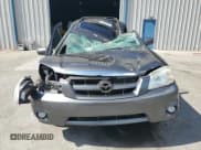 ✅ 2006 Mazda Tribute S • VIN: 4F2YZ06156KM24361 • Lot: 62201885. Listed on Copart with Not provided. Free auction sales archive from the USA and detailed vehicle history report at DreamBid. Image 5.