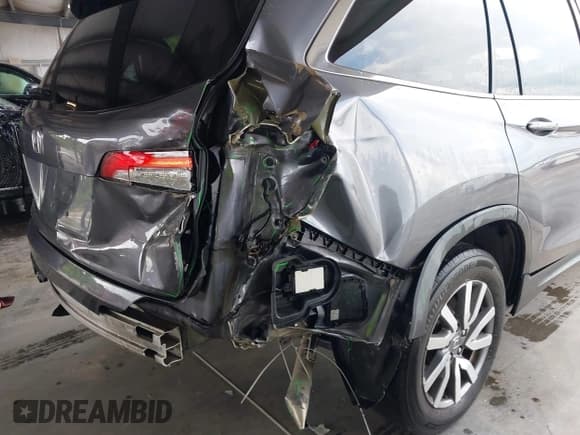 ✅ 2019 Honda Pilot EX-L • VIN: 5FNYF5H56KB041767 • Lot: 42948153. Listed on IAAI with 162,074 mi. Free auction sales archive from the USA and detailed vehicle history report at DreamBid. Image 6.