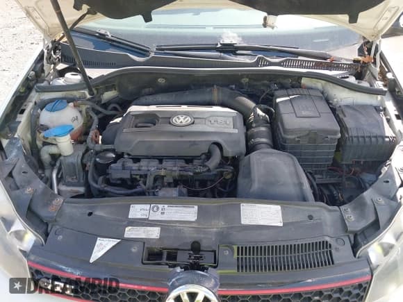 ✅ 2012 Volkswagen Golf GTI w/Conv & Sunroof • VIN: WVWEV7AJ7CW246942 • Lot: 43222962. Listed on IAAI with 116,306 mi. Free auction sales archive from the USA and detailed vehicle history report at DreamBid. Image 10.