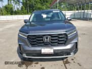 ✅ 2023 Honda Pilot EX-L • VIN: 5FNYG2H45PB006485 • Lot: 62070625. Wystawiony na Copart z przebiegiem 29 936 mil. Bezpłatny archiwum sprzedaży aukcyjnych z USA i szczegółowy raport historii pojazdu na DreamBid. Zdjęcie 5.