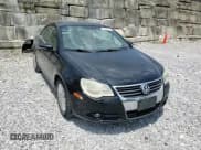 ✅ 2010 Volkswagen Eos Komfort • VIN: WVWBA7AH4AV010148 • Lot: 66596995. Listed on Copart with 132,618 mi. Free auction sales archive from the USA and detailed vehicle history report at DreamBid. Image 14.