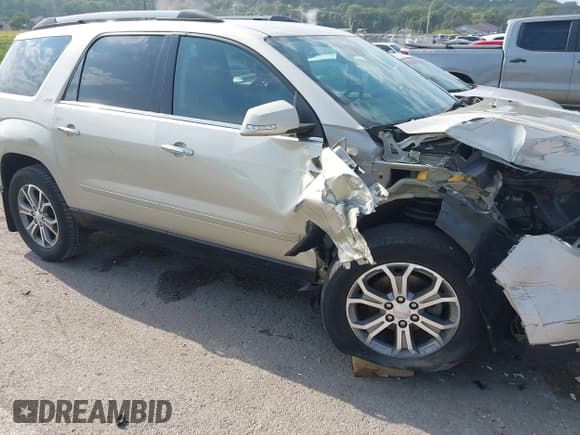 ✅ 2016 GMC Acadia SLT • VIN: 1GKKRSKD7GJ261130 • Lot: 42984908. Listed on IAAI with 107,975 mi. Free auction sales archive from the USA and detailed vehicle history report at DreamBid. Image 18.