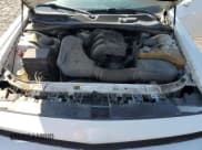 ✅ 2014 Dodge Challenger SXT • VIN: 2C3CDYAG6EH313038 • Lot: 74152354. Wystawiony na Copart z przebiegiem 209 811 mil. Bezpłatny archiwum sprzedaży aukcyjnych z USA i szczegółowy raport historii pojazdu na DreamBid. Zdjęcie 11.