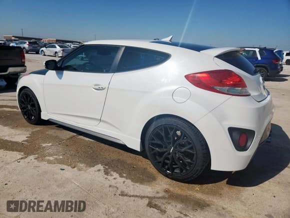✅ 2014 Hyundai Veloster Turbo • VIN: KMHTC6AE7EU191400 • Lot: 80125425. Wystawiony na Copart z przebiegiem 155 013 mil. Bezpłatny archiwum sprzedaży aukcyjnych z USA i szczegółowy raport historii pojazdu na DreamBid. Zdjęcie 2.