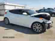 2013 Hyundai Veloster w/Black Int с VIN KMHTC6AD4DU147327, выставлен на аукционе Copart как лот 70406034 с пробегом 121 381 миль миль и Списание • Salvage title. История ставок и продаж доступна на DreamBid. Изображение 4.