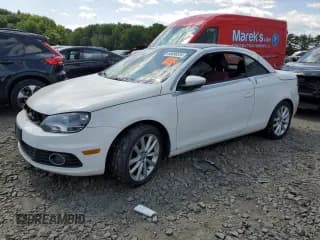 ✅ 2012 Volkswagen Eos Komfort • VIN: WVWBW7AH0CV001399 • Lot: 68496534. Listed on Copart with Not provided. Free auction sales archive from the USA and detailed vehicle history report at DreamBid. Image 1.