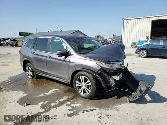 ✅ 2016 Honda Pilot EX-L • VIN: 5FNYF6H82GB034628 • Lot: 80095855. Listed on Copart with 165,831 mi. Free auction sales archive from the USA and detailed vehicle history report at DreamBid. Image 15.