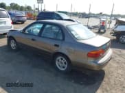 ✅ 2000 Chevrolet Prizm • VIN: 1Y1SK5280YZ426387 • Lot: 42804574. Listed on IAAI with 175,523 mi. Free auction sales archive from the USA and detailed vehicle history report at DreamBid. Image 3.