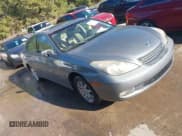 ✅ 2002 Lexus ES 300 • VIN: JTHBF30GX20067048 • Lot: 43636008. Listed on IAAI with 198,747 mi. Free auction sales archive from the USA and detailed vehicle history report at DreamBid. Image 1.