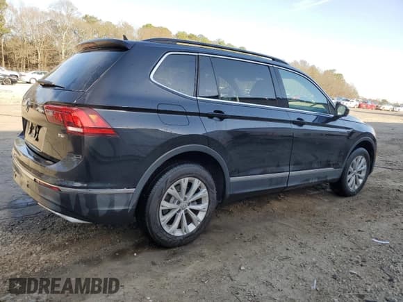 ✅ 2018 Volkswagen Tiguan SEL • VIN: 3VV3B7AX2JM137890 • Лот: 48318645. Опубликован ранее на Copart с пробегом 112 602 миль. Бесплатный доступ к архиву аукционных продаж из США и подробный отчёт об истории автомобиля на DreamBid. Изображение 3.