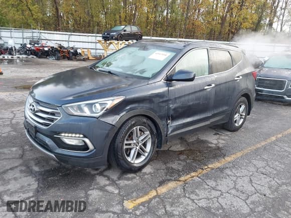 ✅ 2017 Hyundai Santa Fe 2.4L • VIN: 5NMZUDLB1HH018289 • Lot: 43513950. Wystawiony na IAAI z przebiegiem 111 768 mil. Bezpłatny archiwum sprzedaży aukcyjnych z USA i szczegółowy raport historii pojazdu na DreamBid. Zdjęcie 17.